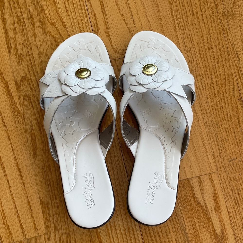 White Floral Slide Sandals with Gold Accent. The soft soles make your feet comf
